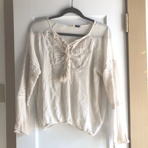 White flowy long sleeve top with shoelace neckline from brace soul boutique